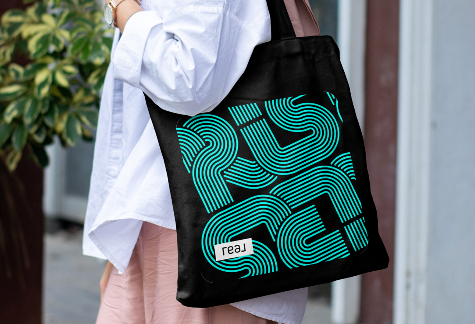 Graphic depicting a mountain peak at sunset cropped in a circle with the words RANGE CRAZY above and below.