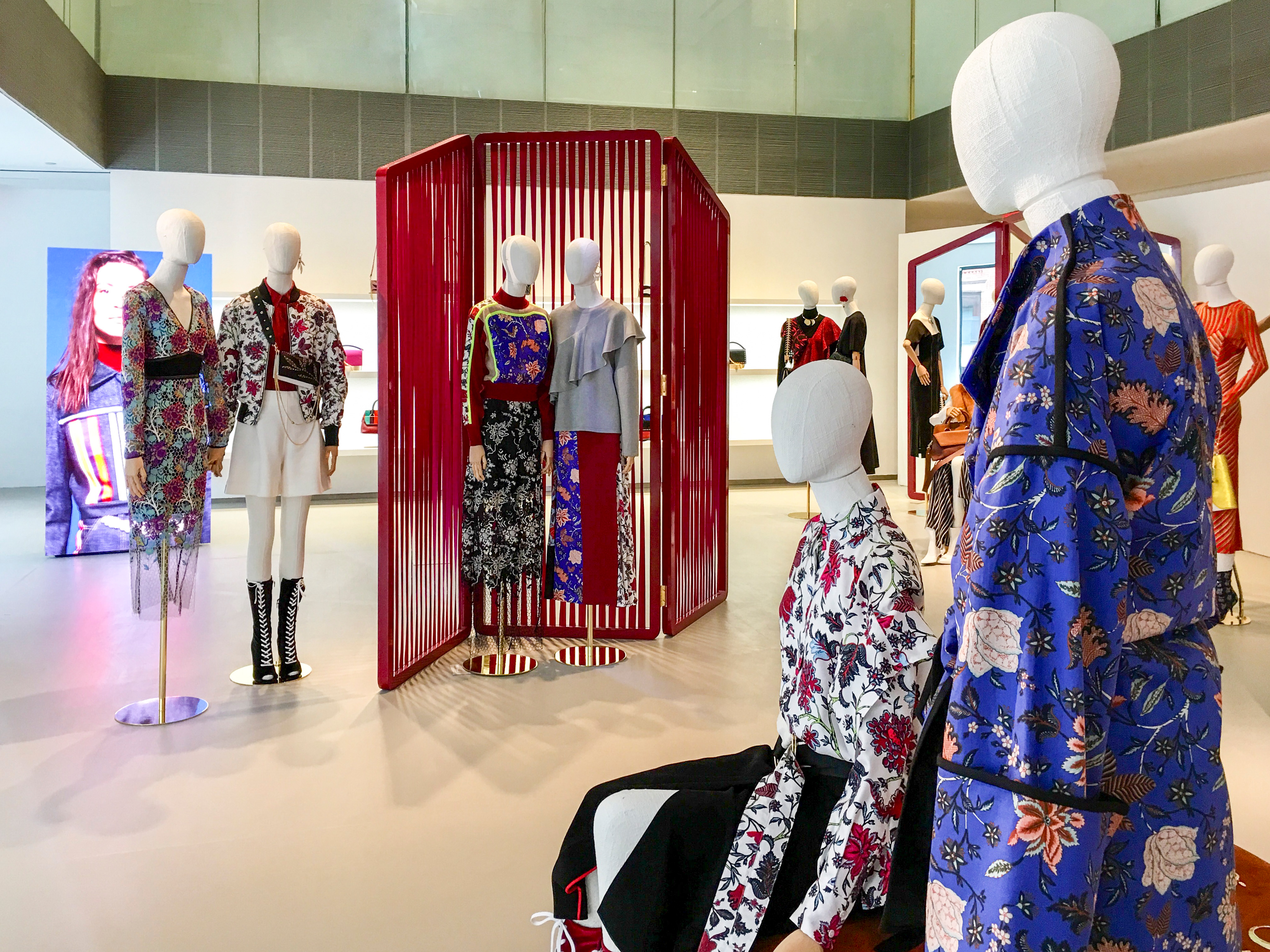 Graphic depicting UI-styled buttons with different categories of interior design items on top of an image of a modern interior living room.